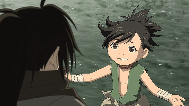 A young boy, Dororo, shurgs his shoulders in front of Hyakkimaru, a sixteen year old boy with long hair
