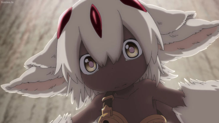 An animal-like girl covered in white fur and brown skin,, Faputa, stares with wide open golden eyes. From Made in Abyss season 2. 