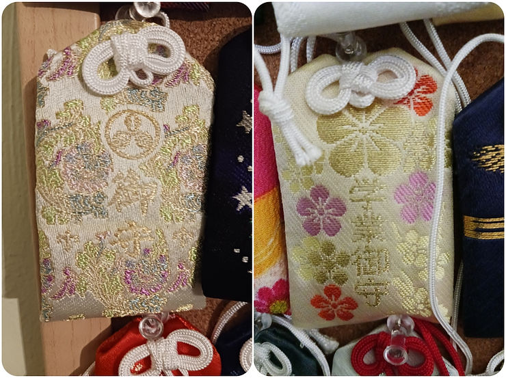 At left an ornately patterned omamori with flowers, at right a Dazaifu Tenmangu omamori with plum blossoms.