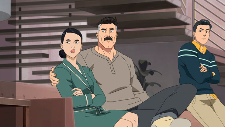 Mr. and Mrs. Grayson sitting on couch with Mark from INVINCIBLE